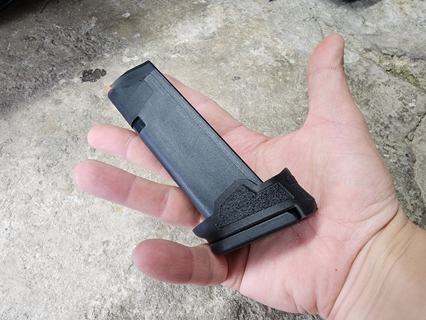 with a snug fit, the NULL Adapter stays on the magazine, whether on the gun, in a carrier, your gun bag, or a pocket.  You can always count on it being where it should be, so you can use it without concern. 