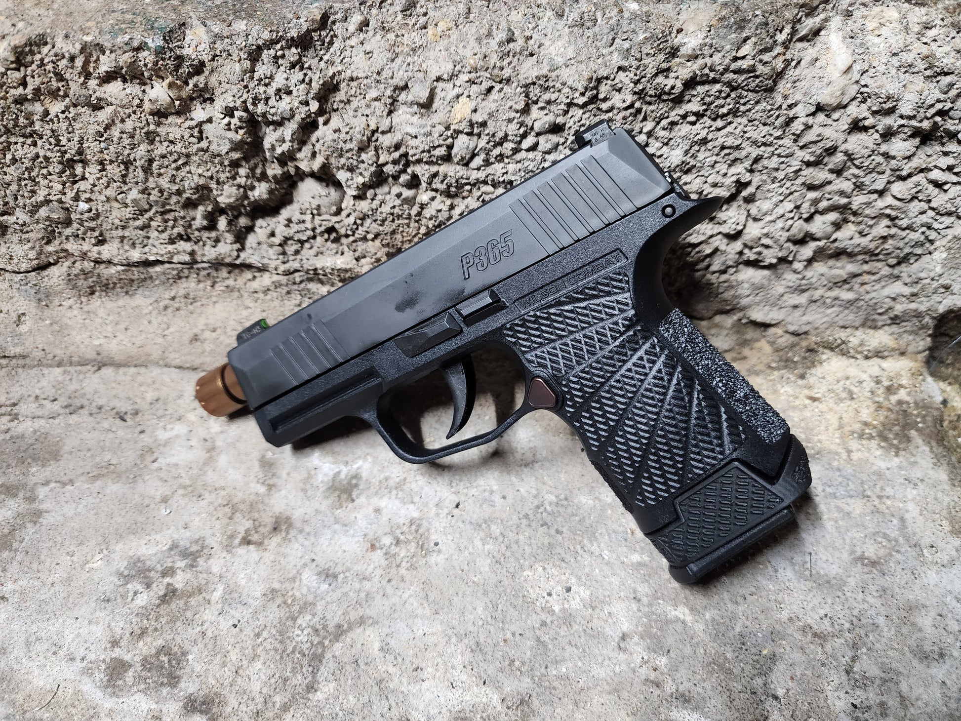 The P365 wilson combat grip module not only improves the ergonomics, but the looks of the P365, and the NULL adapter lets you extend that to a 12 round magazine any time you want. 