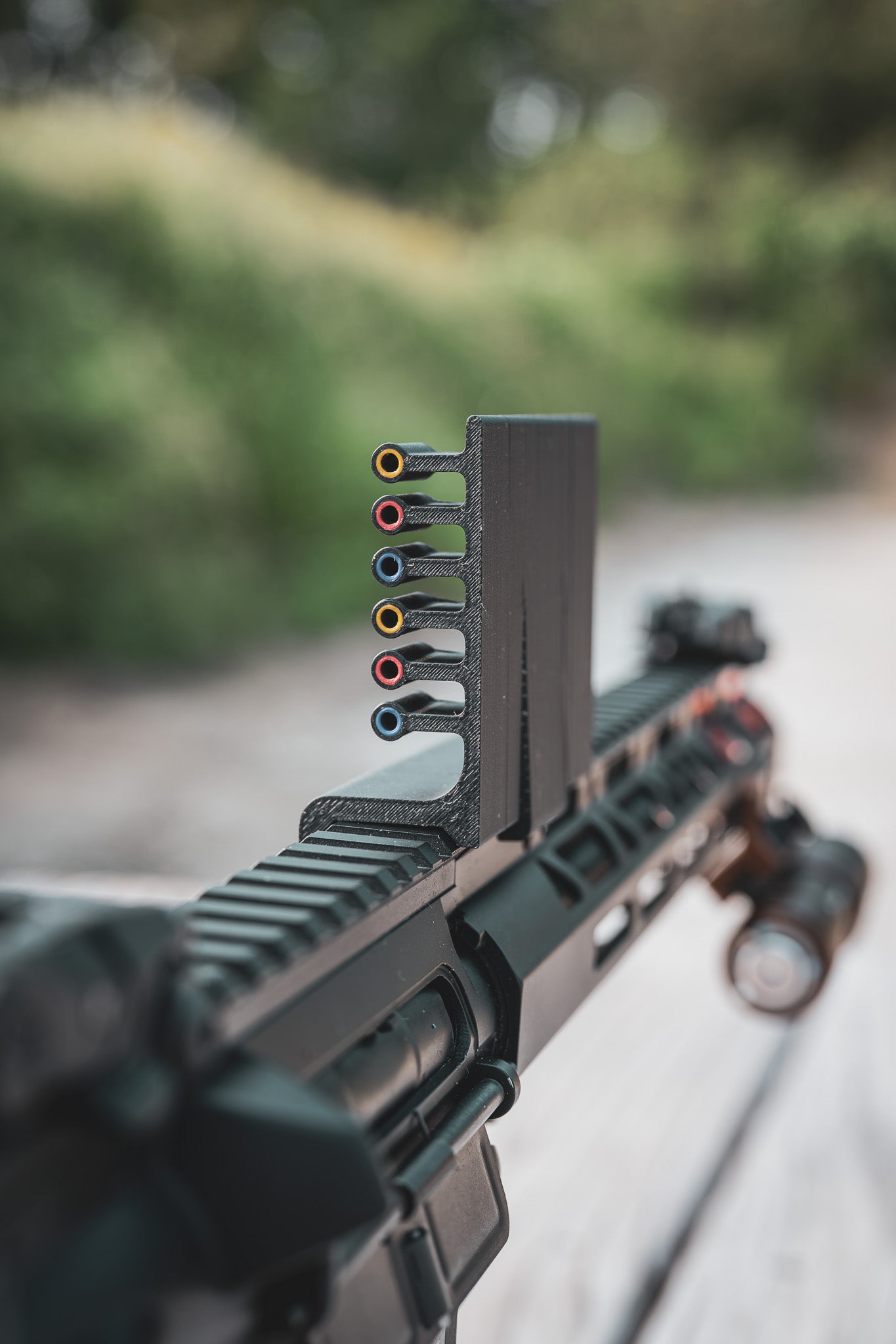 It's as simple as lining up the colors through the peep, and seeing how high your eyes sit over the rail of your rifle.  Then, match up the optic height to your eye height. 