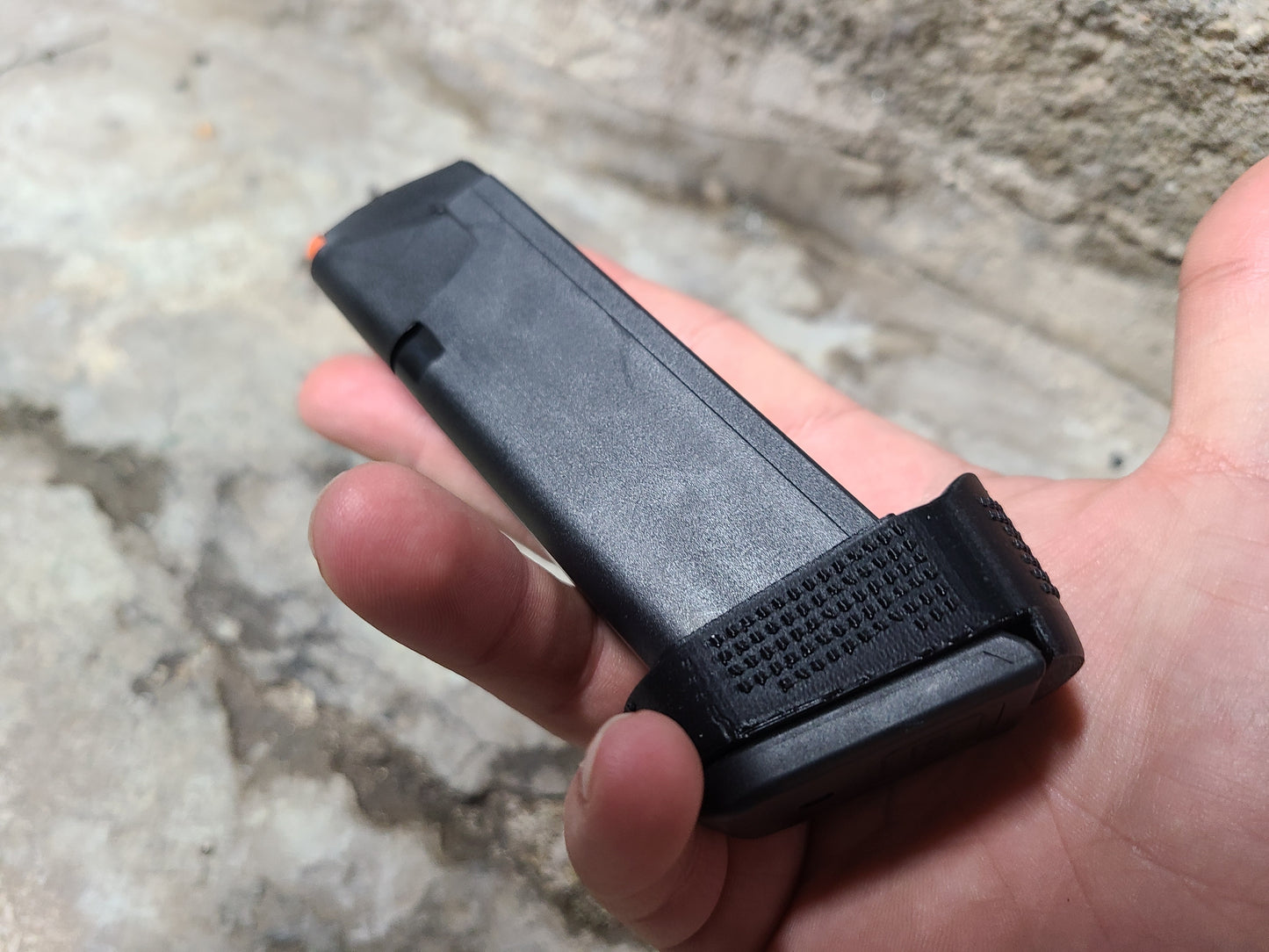 Glock 19 magazine adapter lets you run 17 round magazines in your compact Glock 19