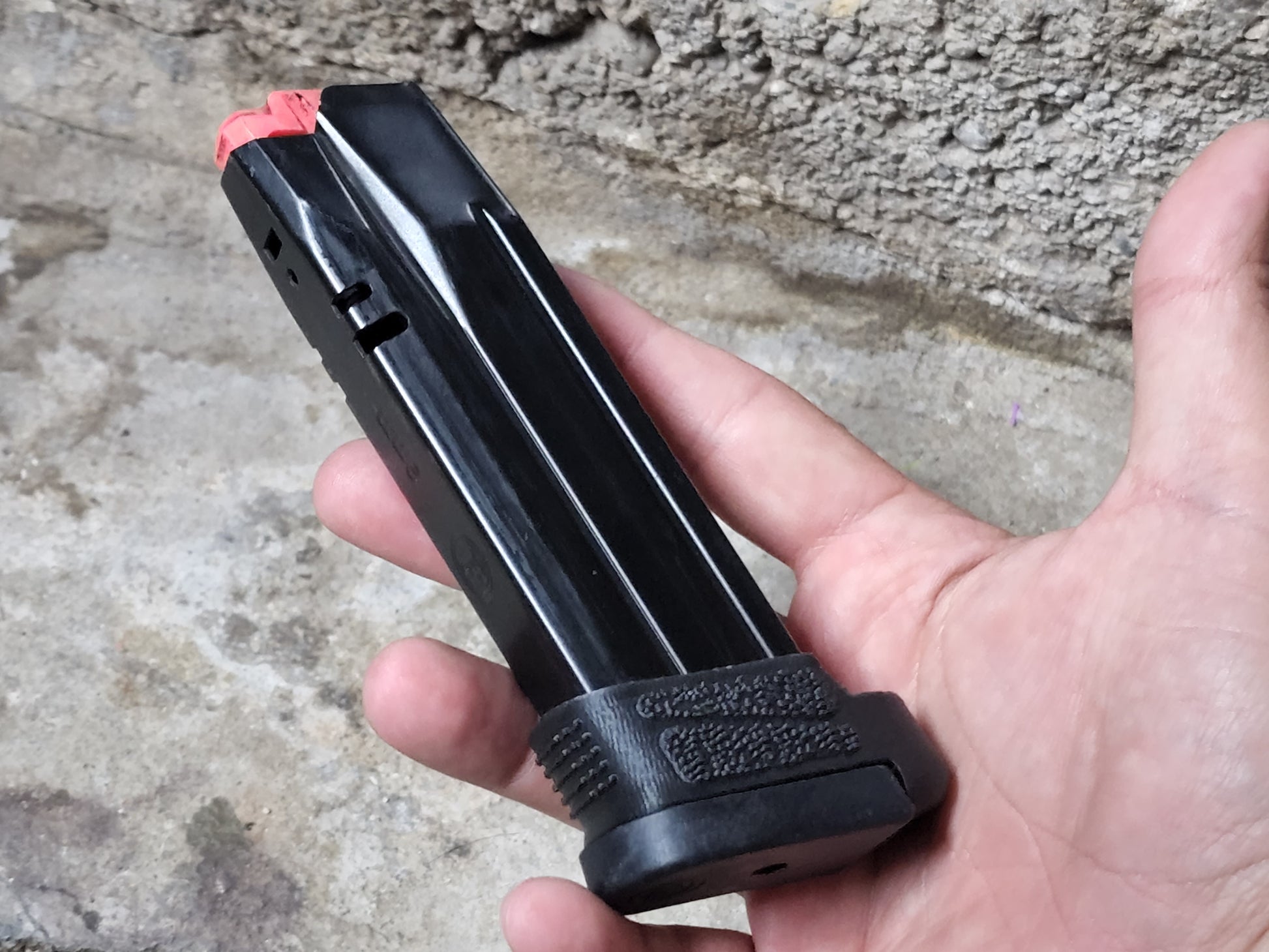 Custom designed and 3D printed adapter sleeve for the CZ P07 allowing the use of the P09 magazine